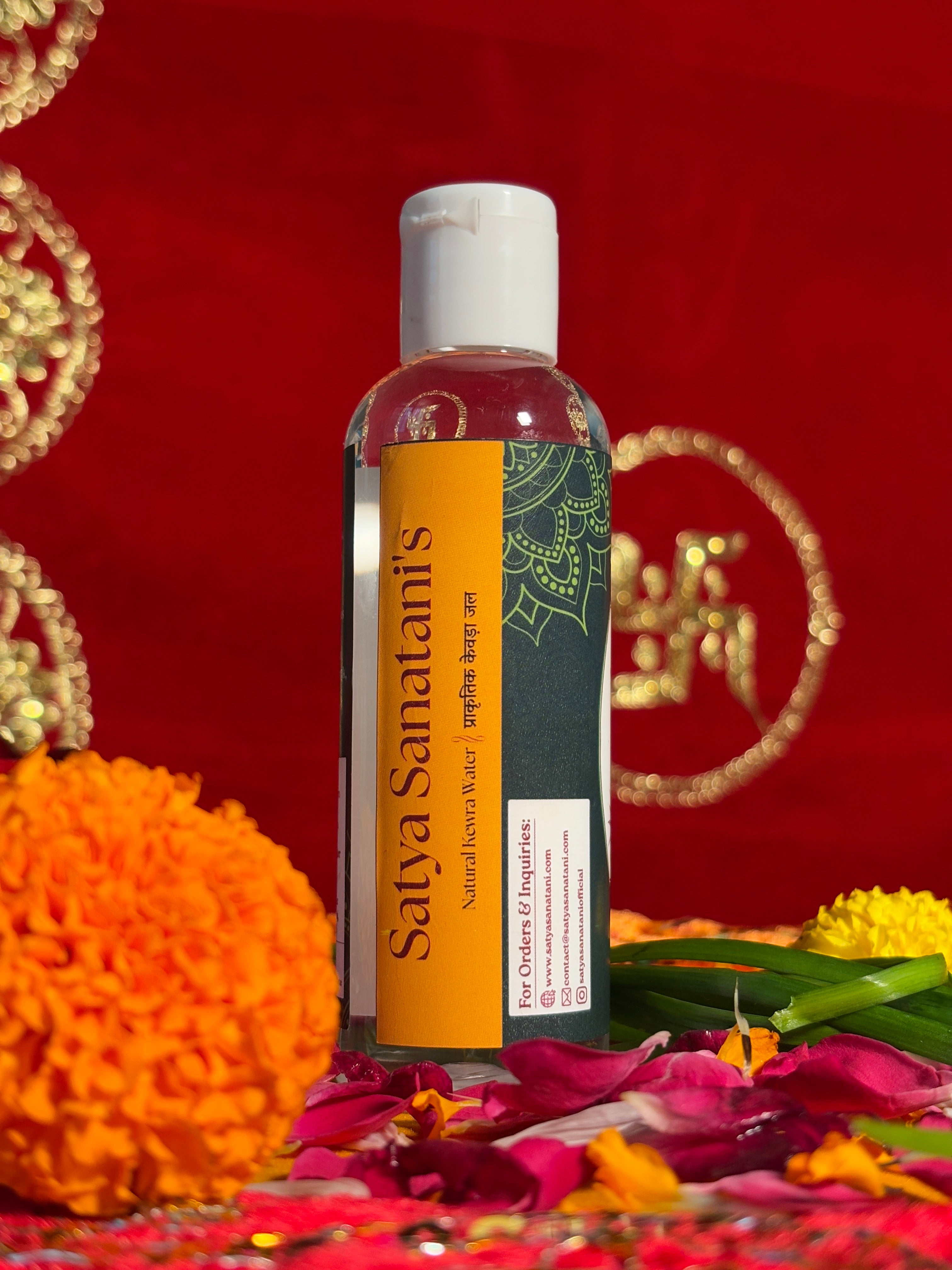 Pure Kewra Water bottle displayed with flowers for temple rituals