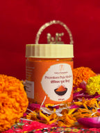 Satya Sanatani Puja Sindoor 100gm jar with orange powder and puja flowers