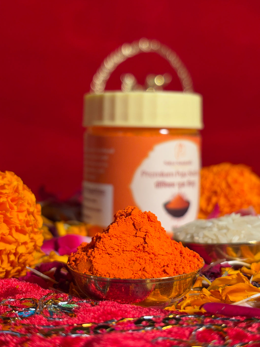 Devotional Sindoor container surrounded by rose and marigold flowers for rituals