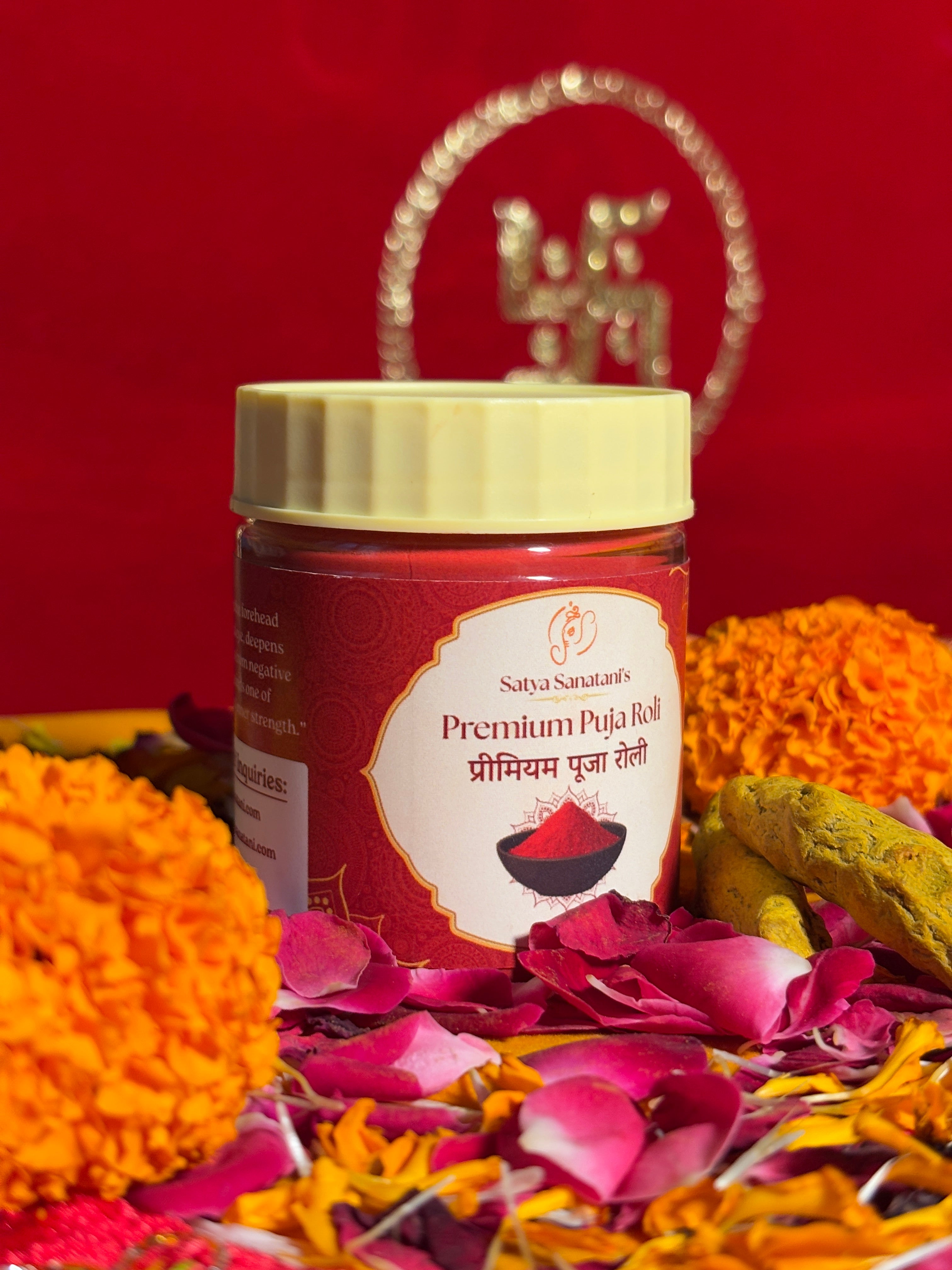 Premium Puja Roli container with red sacred powder and puja flowers