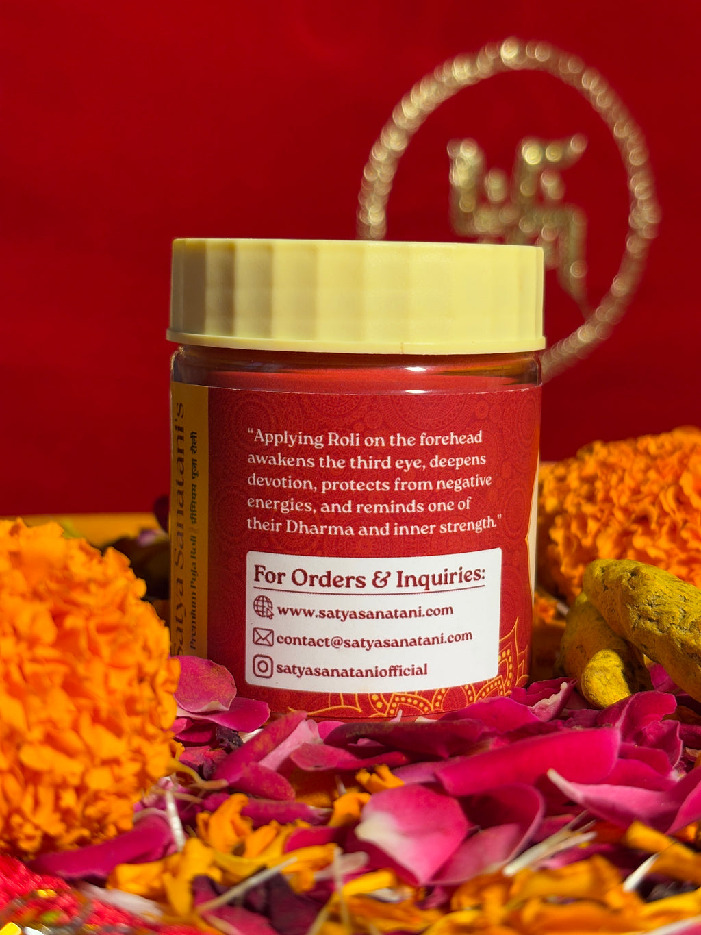 Top view of bright red Roli powder container for tilak rituals