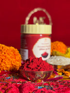 Premium Satya Sanatani Puja Roli jar with sacred red powder and puja flowers