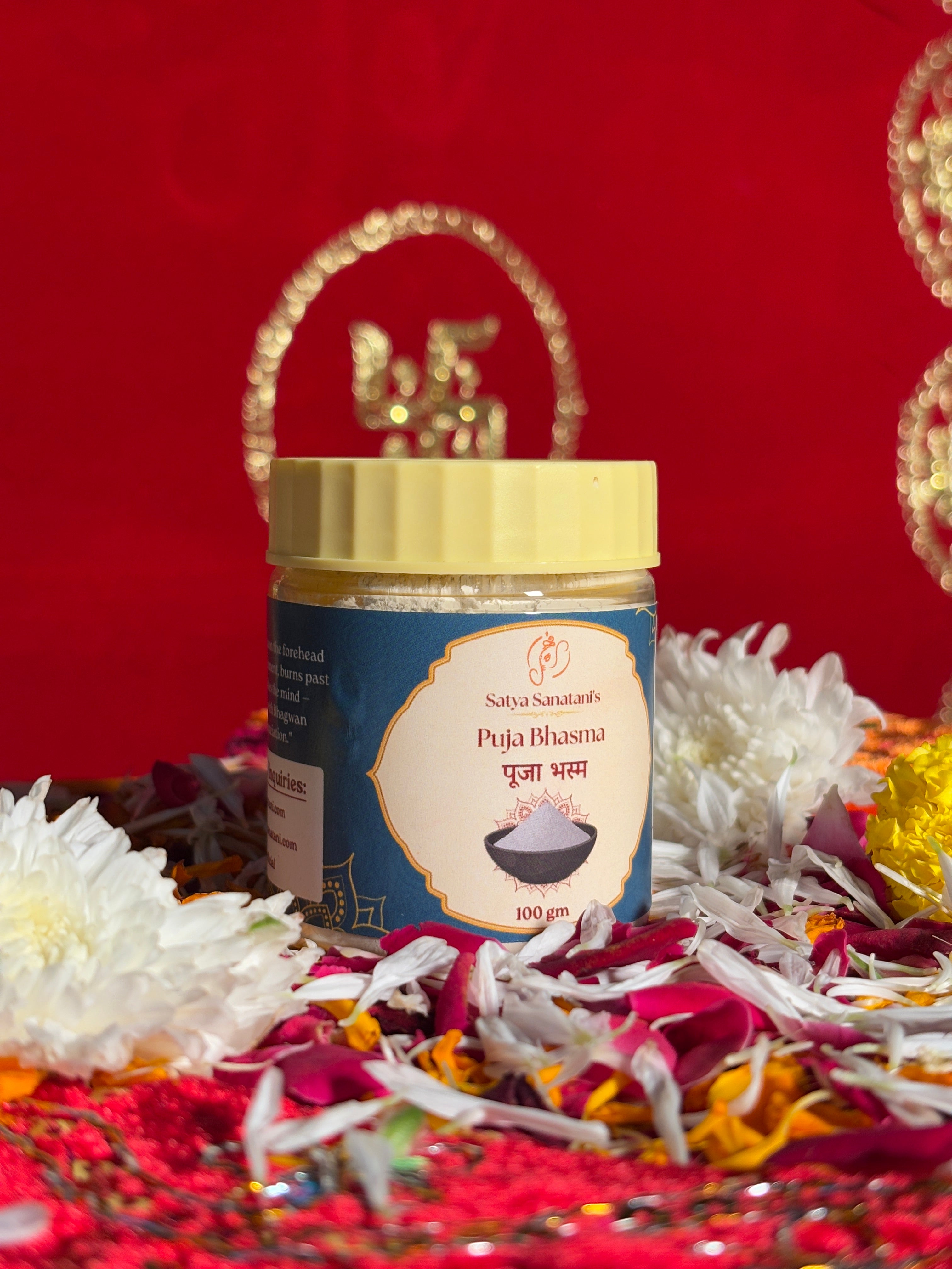 Satya Sanatani Puja Bhasma 100gm jar with sacred ash and puja flowers