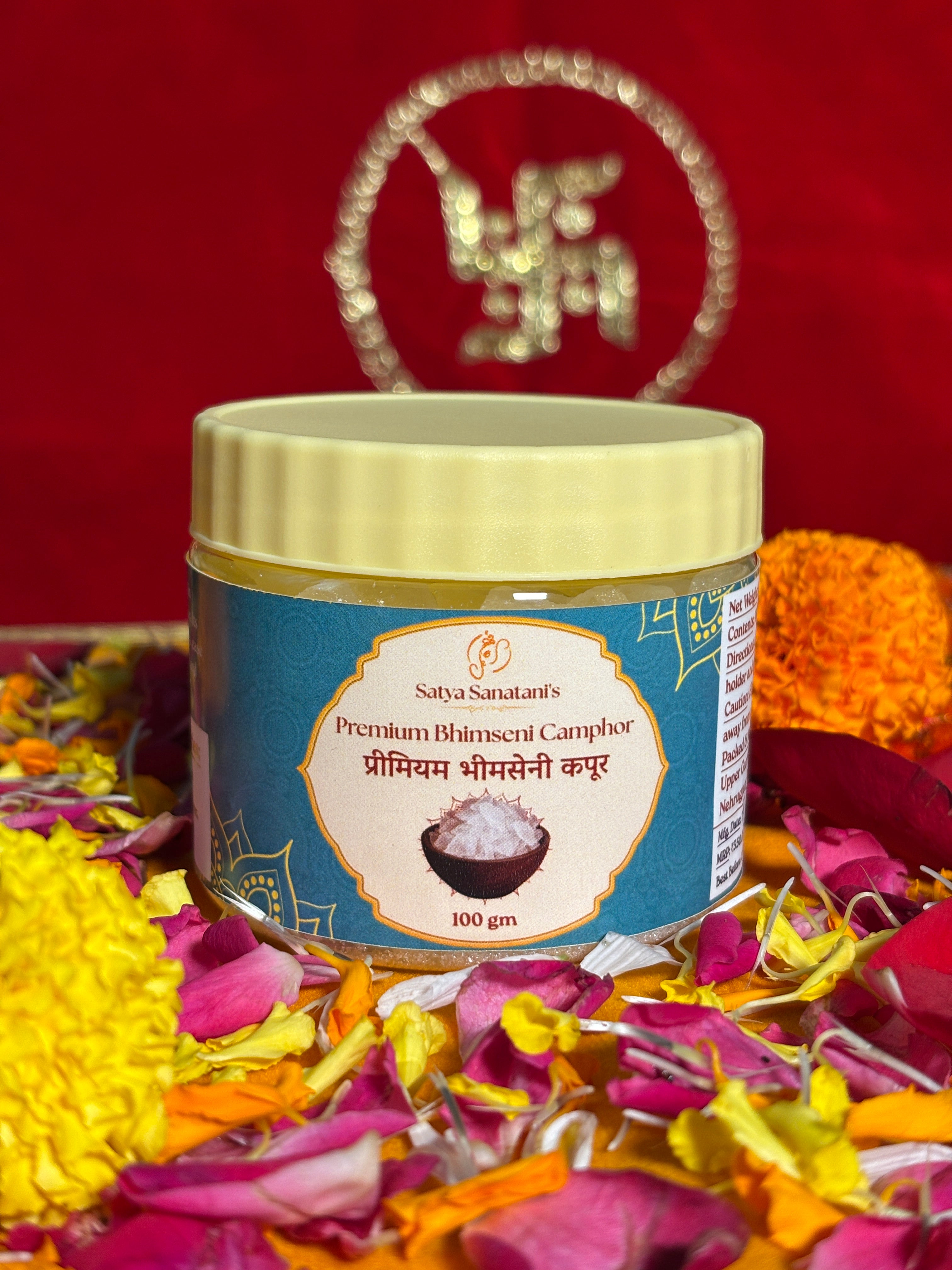 Premium devotional Bhimseni Kapoor container front view with saffron backdrop