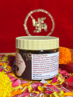 Premium devotional Guggal container front view with saffron backdrop