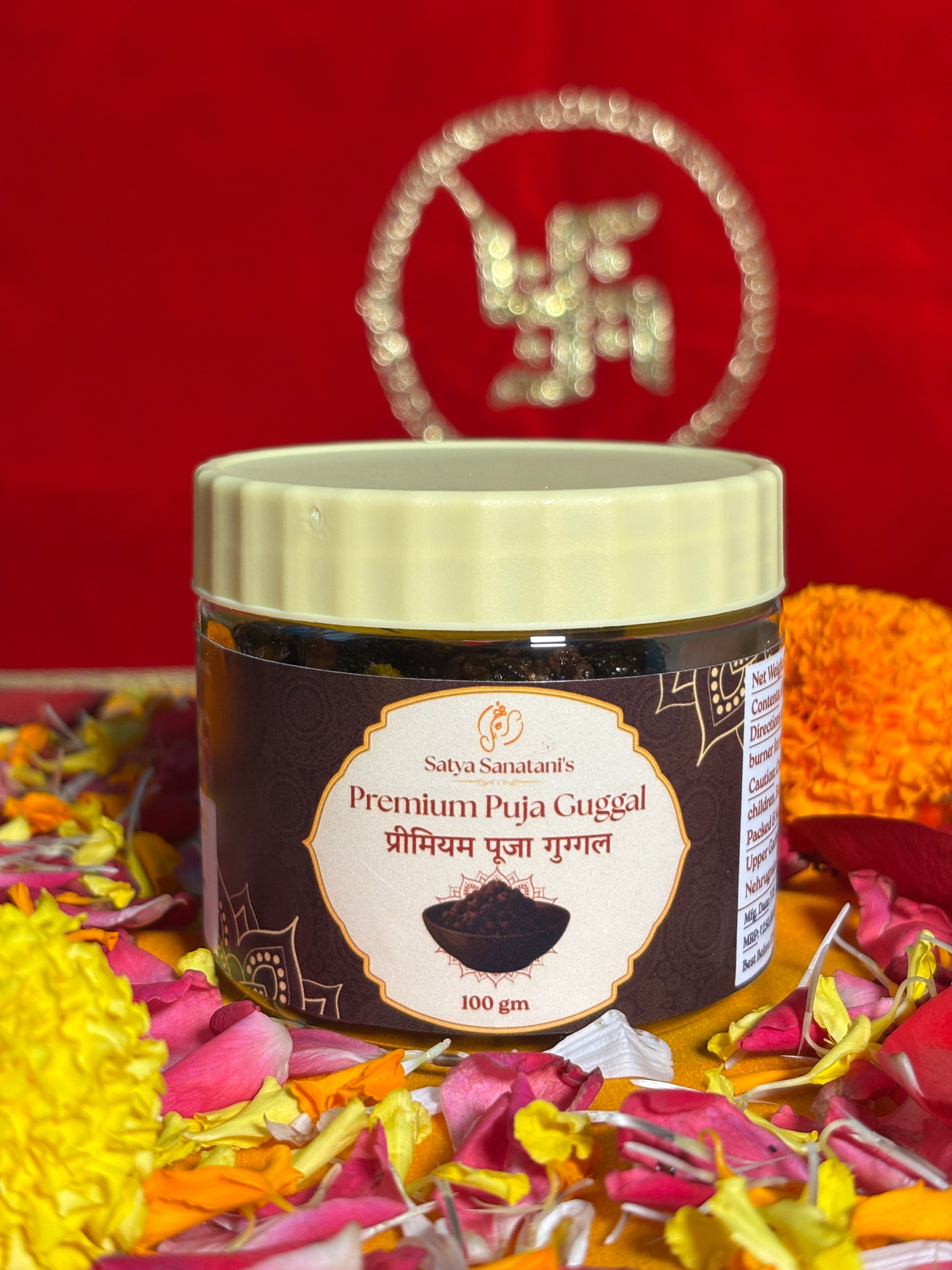 Premium devotional Guggal container front view with saffron backdrop