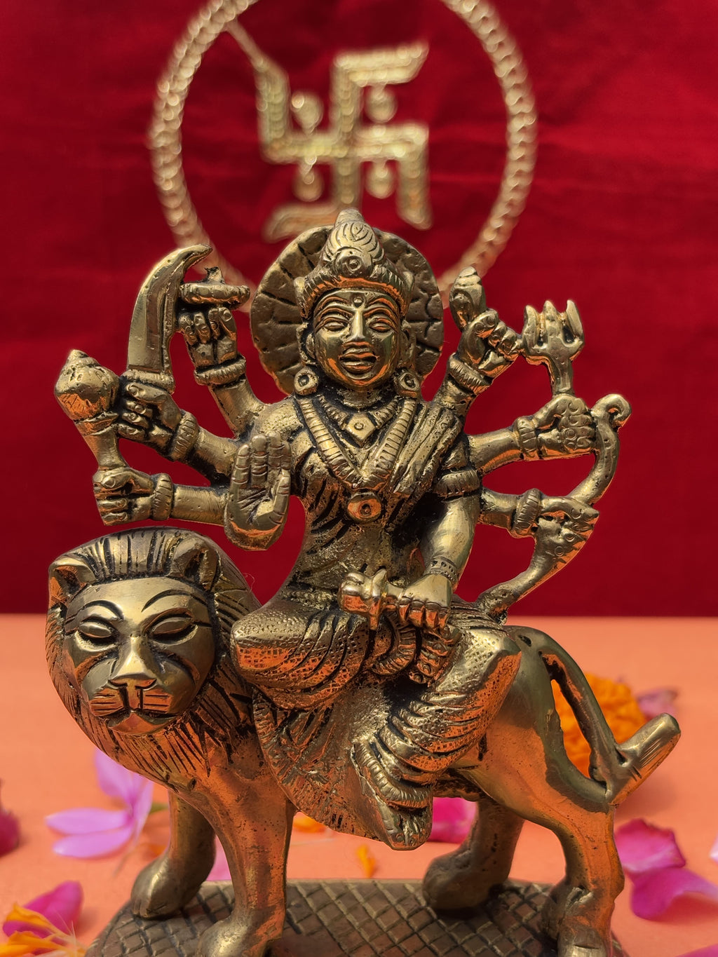 Brass idol of Maa Durga slaying Mahishasura, detailed ornaments and lion figure