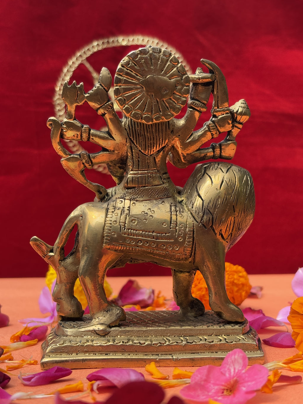 Back view of Mahishasura Mardini Durga idol showing brass detailing and design