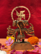 Brass Panchmukhi Hanuman Statue with Swastik backdrop and floral decorations
